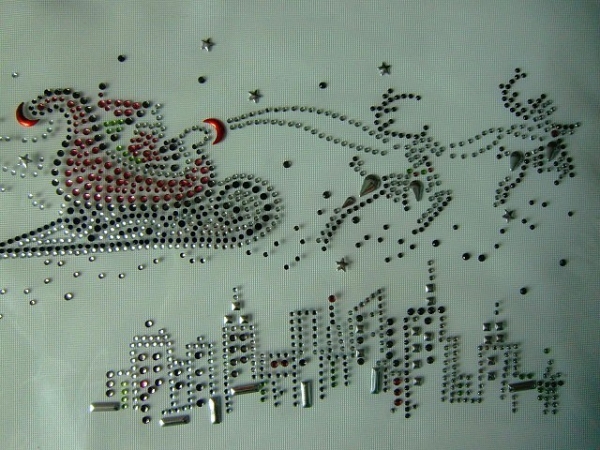 Hirsche Hirsche mit Schlitten über der Stadt Strass Bügelbild Hotfix Hotglue